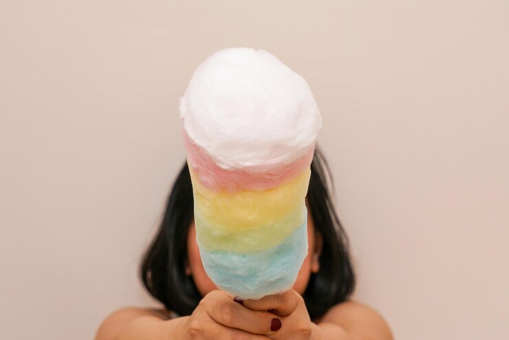 cotton candy in hand of child